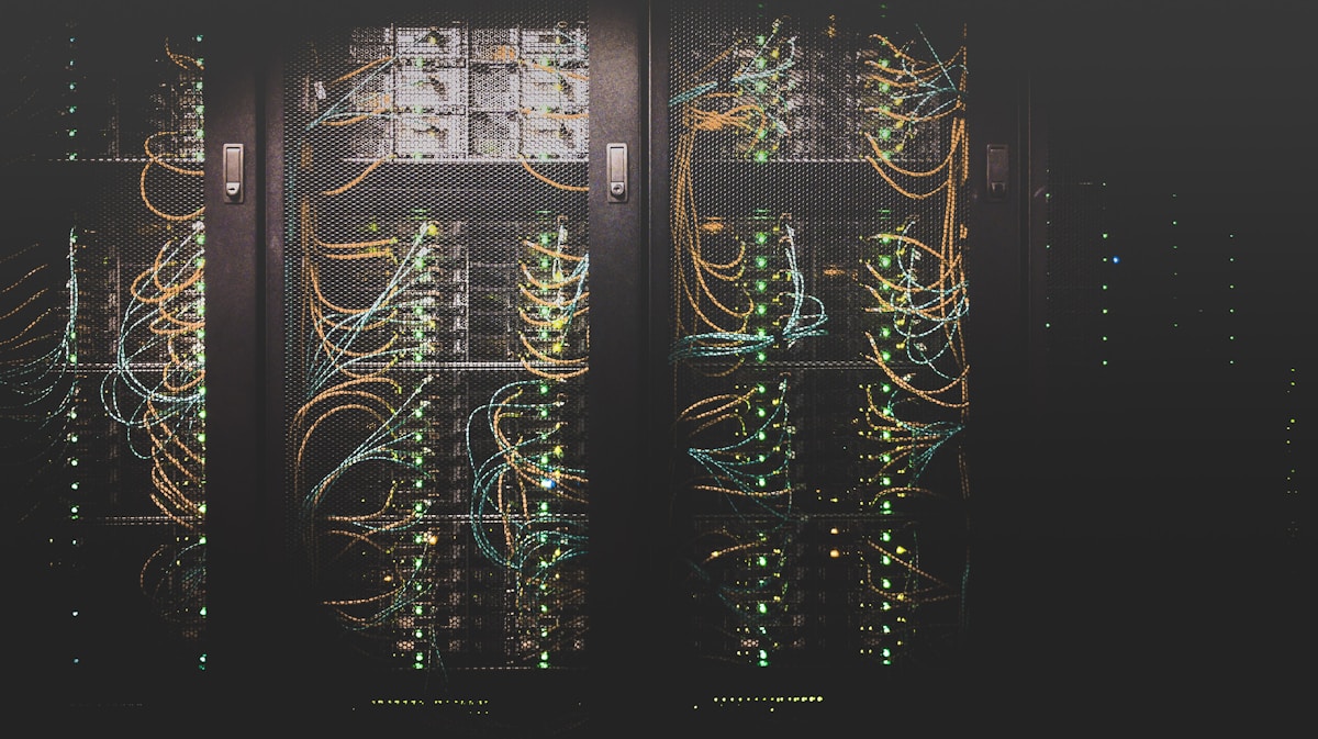 Server racks and network cabling, representing WordPress API and integration development